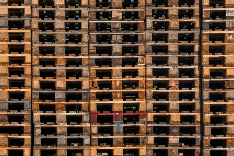 a-large-stack-of-wooden-pallets